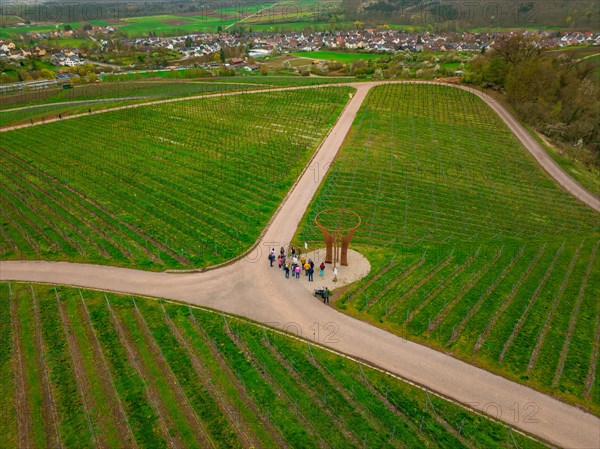 Viewpoint with circular structure amidst vineyards and paths in daylight, Jesus Grace Chruch, Weitblickweg, Easter hike, Hohenhaslach, Germany, Europe