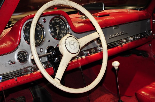 Museum, Mercedes-Benz Museum, Stuttgart, Detailed cockpit view of a vintage Mercedes with red accents, Mercedes-Benz Museum, Stuttgart, Baden-Wuerttemberg, Germany, Europe