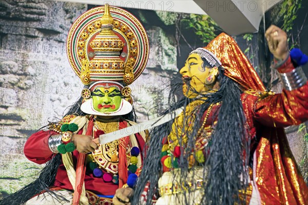 Kathakali performer or mime, 38 and 60 years old, on stage at the Kochi Kathakali Centre, Kochi, Kerala, India, Asia