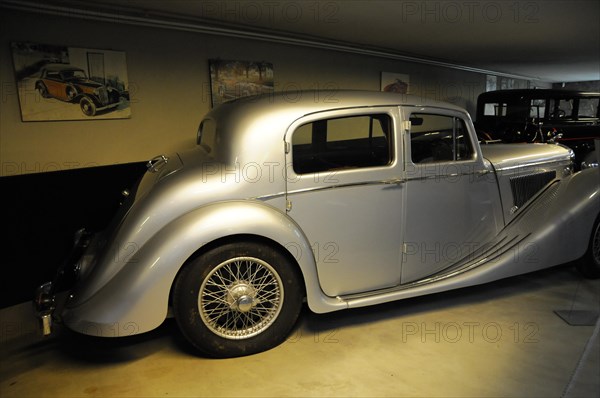 Deutsches Automuseum Langenburg, A grey classic car in a garage, radiating elegance and history, Deutsches Automuseum Langenburg, Langenburg, Baden-Wuerttemberg, Germany, Europe