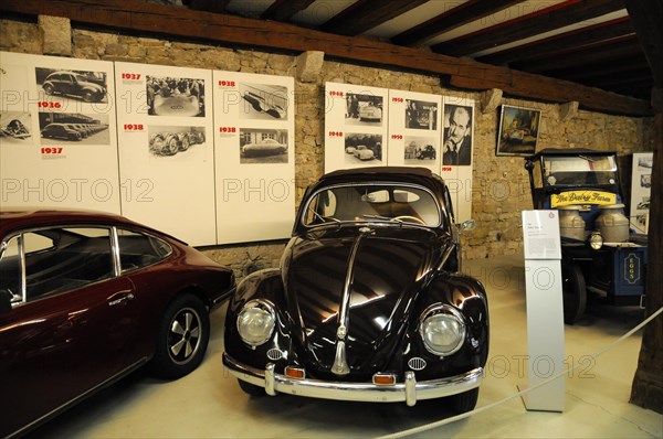 Deutsches Automuseum Langenburg, A black, classic Volkswagen Beetle parked in a historic exhibition room, Deutsches Automuseum Langenburg, Langenburg, Baden-Wuerttemberg, Germany, Europe