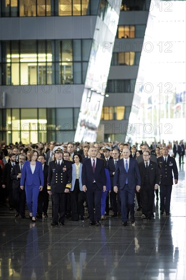 The Secretary-General of the North Atlantic Council and the Allied Foreign Ministers, the Permanent Representatives and the Chairman of the Military Committee take their seats in the Agora during the ceremony to mark the 75th anniversary of the signing of the founding document of the North Atlantic Treaty. Brussels, 04.04.2024. Photographed on behalf of the Federal Foreign Office