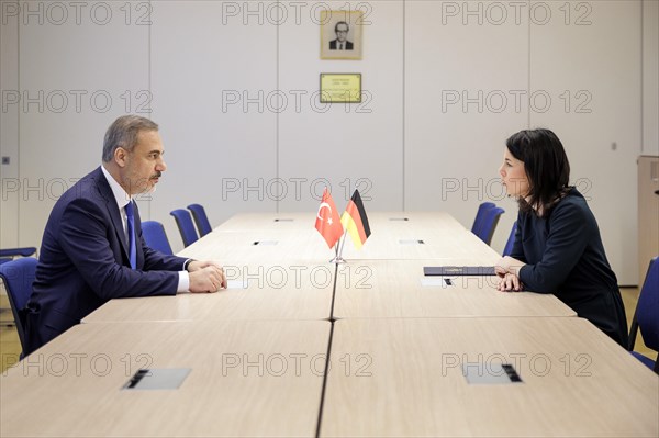 (R-L) Annalena Baerbock, Federal Minister for Foreign Affairs, meets Hakan Fidan, Minister for Foreign Affairs of the Republic of Turkey, for talks on the margins of the NATO Foreign Ministers' Meeting. Brussels, 04.04.2024. Photographed on behalf of the Federal Foreign Office