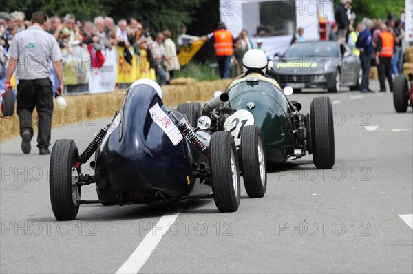 Two classic racing cars competing on a track with an audience, SOLITUDE REVIVAL 2011, Stuttgart, Baden-Wuerttemberg, Germany, Europe