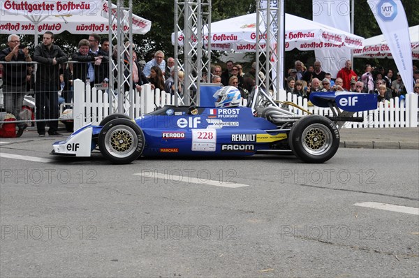 Blue and yellow formula racing car drives in front of spectators at the race track, SOLITUDE REVIVAL 2011, Stuttgart, Baden-Wuerttemberg, Germany, Europe