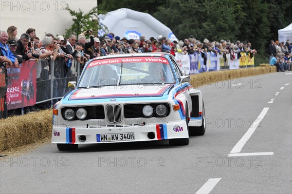 BMW racing car at a motorsport event with spectators in the background, SOLITUDE REVIVAL 2011, Stuttgart, Baden-Wuerttemberg, Germany, Europe