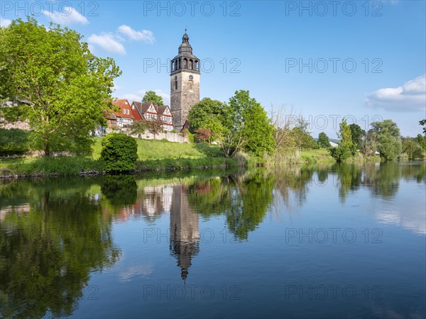St Crucis Church, half-timbered houses and town wall in the historic old town of Allendorf, reflection in the river Werra, Hessian Highlands, Werra Valley, Werra, Bad Sooden-Allendorf, Hesse, Germany, Europe