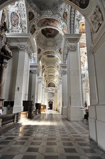 St Stephan Cathedral, Passau, Elongated interior of a church with columns and rays of light falling through windows, Passau, Bavaria, Germany, Europe