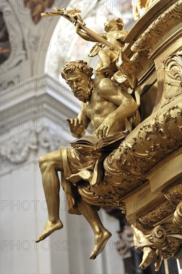 St Stephen's Cathedral, Passau, Golden sculpture of an angel with musical instrument in detail, surrounded by ornaments, St Stephen's Cathedral, Passau, Bavaria, Germany, Europe