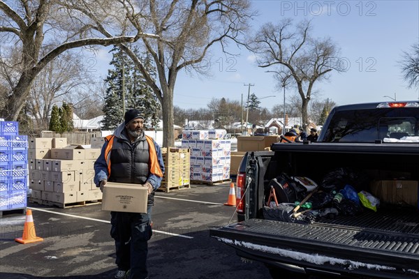 Detroit, Michigan, Free food is distributed to people attending a community health fair