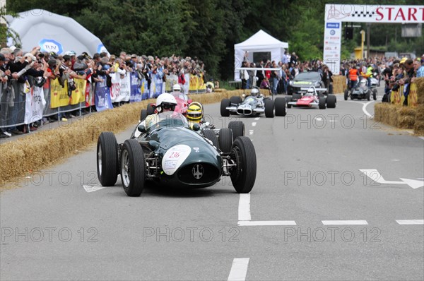 A historic racing car passes the crowd at a motorsport event, SOLITUDE REVIVAL 2011, Stuttgart, Baden-Wuerttemberg, Germany, Europe