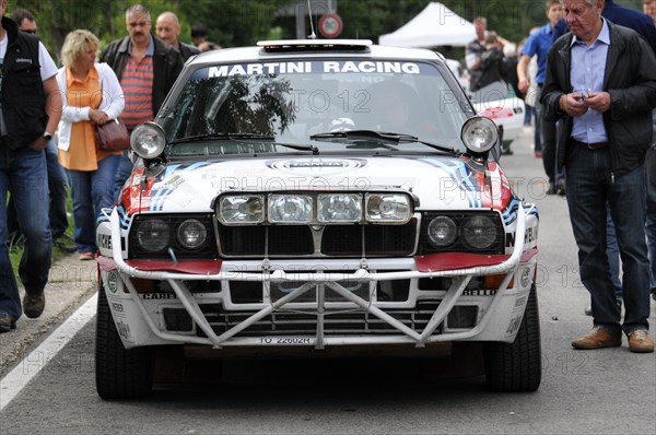 A rally car with Martini Racing design and additional headlights stands in front of spectators, SOLITUDE REVIVAL 2011, Stuttgart, Baden-Wuerttemberg, Germany, Europe