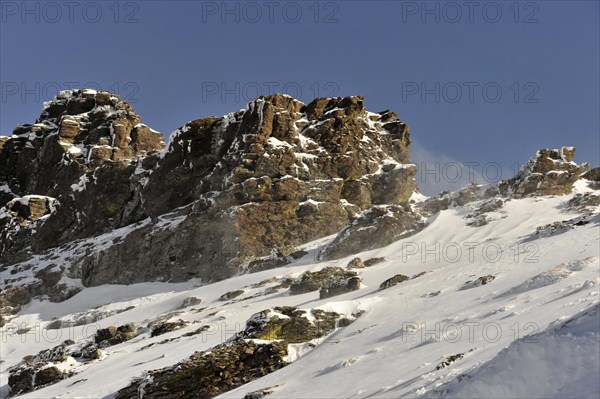 Mountains in Andalusia, mountain range with snow, near Pico del Veleta, 3392m, Gueejar-Sierra, Sierra Nevada National Park, Rugged rocks rise up from the snow-covered landscape, Costa del Sol, Andalusia, Spain, Europe