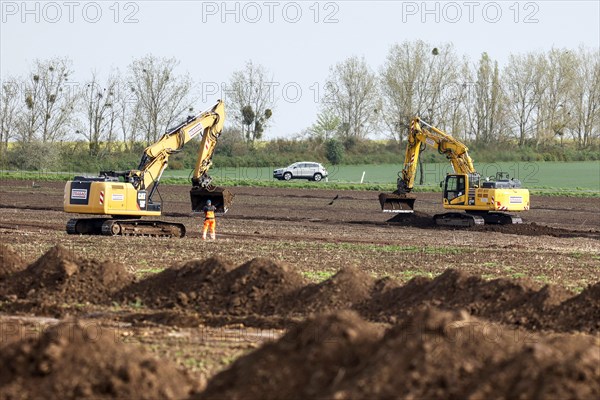 Excavators begin preparations for the construction site access road on the L 50 at the future Intel construction site in Magdeburg. The state of Saxony-Anhalt is financing the expansion of two construction site access roads from the L 50 state road to the Intel site, 08.04.2024., Magdeburg, Saxony-Anhalt, Germany, Europe