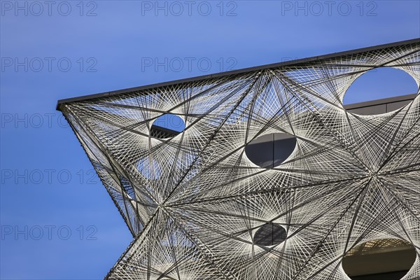 Reutlingen University, Reutlingen University, Texoversum, German University Building Award 2024 for TEXOVERSUM, modern architecture, facade made of carbon and glass fibres, mesh, innovative, identity-creating, unique facade, campus, place of learning, special, extraordinary new building for textile courses, light, airy, airy, holes, detail, architectural eye-catcher, Reutlingen, Baden-Wuerttemberg, Germany, Europe