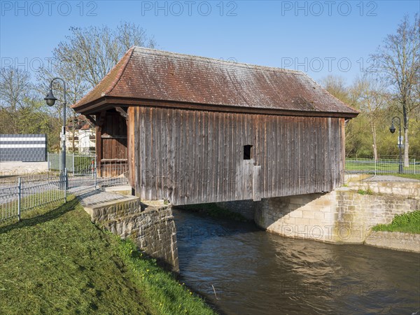 The Salt Bridge, covered wooden bridge over the River Ilm, Grossheringen, Thuringia, Germany, Europe