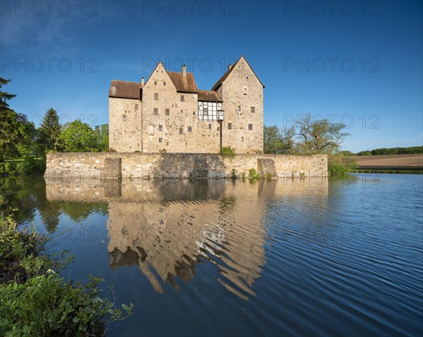 Wasserburg, moated castle Brennhausen near Sulzdorf an der Lederhecke, Hassberge, Rhoen-Grabfeld, Lower Franconia, Bavaria, Germany, Europe