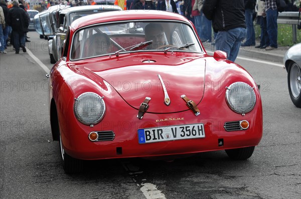 Red classic Porsche on a street, surrounded by people at an event, SOLITUDE REVIVAL 2011, Stuttgart, Baden-Wuerttemberg, Germany, Europe