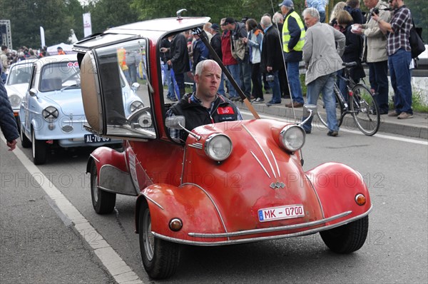 Red three-wheeler car with open top and driver, at an event, SOLITUDE REVIVAL 2011, Stuttgart, Baden-Wuerttemberg, Germany, Europe