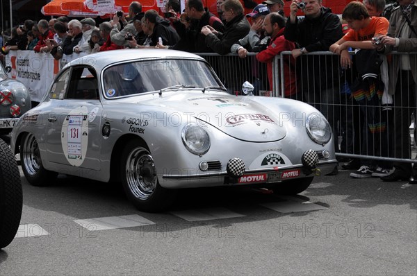 A silver classic sports car is watched by spectators, SOLITUDE REVIVAL 2011, Stuttgart, Baden-Wuerttemberg, Germany, Europe