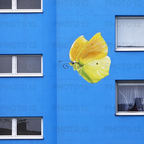 Sunflower house, painted yellow lemon butterfly on a skyscraper, artist Ulrich Allgaier, Wuppertal, North Rhine-Westphalia, Germany, Europe