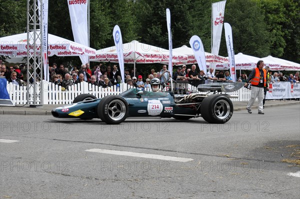 A green formula racing car on a race track driven by a driver, SOLITUDE REVIVAL 2011, Stuttgart, Baden-Wuerttemberg, Germany, Europe