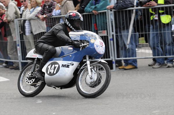 A motorbike racer on a closed-off track during a competition, SOLITUDE REVIVAL 2011, Stuttgart, Baden-Wuerttemberg, Germany, Europe