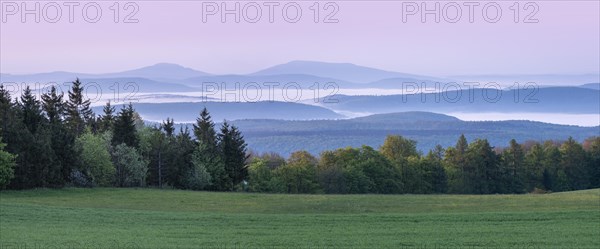 Panorama, view over endless chains of hills and forests at Gebaberg at dawn, fog in the valleys, Hohe Geba, Vordere Rhoen, Meiningen, Rhoen, Thuringia, Germany, Europe