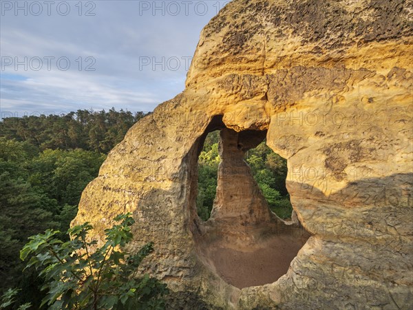 Cave at Klusfelsen in the Klusberge mountains, prehistoric place of worship, later Christian hermitage and cave dwelling, Kluskapelle, sandstone rock with natural and artificial caves in the Harz Mountains, Halberstadt, Saxony-Anhalt, Germany, Europe