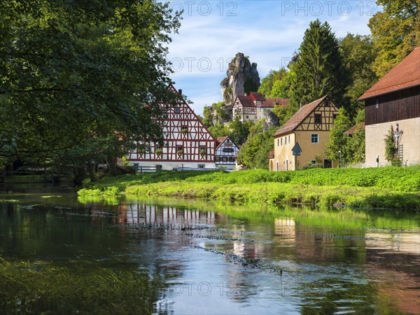 Zechenstein rock formation and half-timbered houses on the Puettlach river, rock castle and Franconian Switzerland Museum, former Judenhof, Tuechersfeld, Franconian Switzerland, Franconian Alb, Upper Franconia, Franconia, Bavaria, Germany, Europe