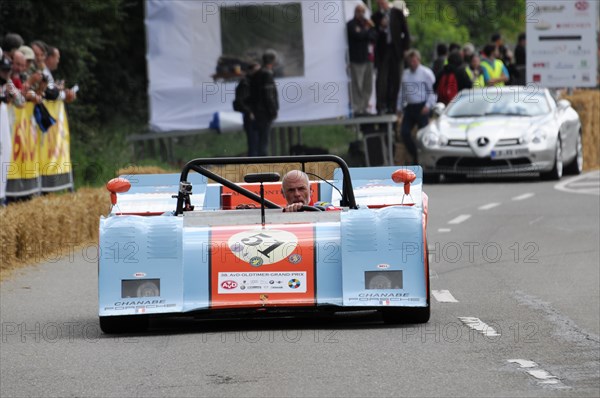 A blue and white open-top racing car with the driver in a helmet on a race track, SOLITUDE REVIVAL 2011, Stuttgart, Baden-Wuerttemberg, Germany, Europe