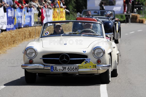 White vintage convertible takes part in a classic car meeting, SOLITUDE REVIVAL 2011, Stuttgart, Baden-Wuerttemberg, Germany, Europe