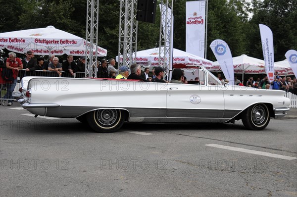 White convertible vintage luxury car presents itself in front of a crowd, SOLITUDE REVIVAL 2011, Stuttgart, Baden-Wuerttemberg, Germany, Europe