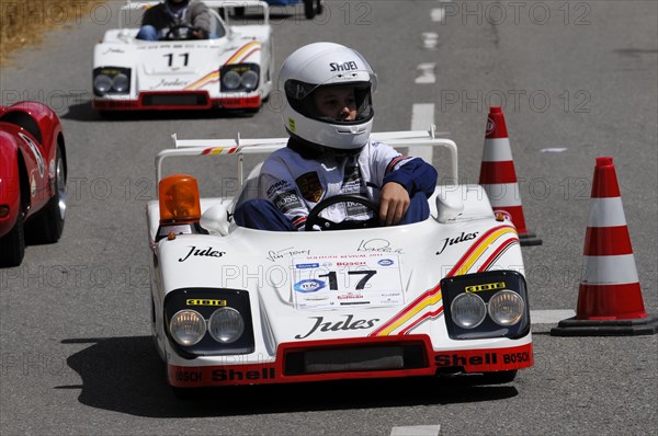 Racers in white miniature cars on a race track with spectator participation, SOLITUDE REVIVAL 2011, Stuttgart, Baden-Wuerttemberg, Germany, Europe