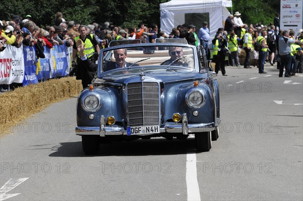 A blue Mercedes Cabriolet vintage car driving at an event, surrounded by spectators, SOLITUDE REVIVAL 2011, Stuttgart, Baden-Wuerttemberg, Germany, Europe