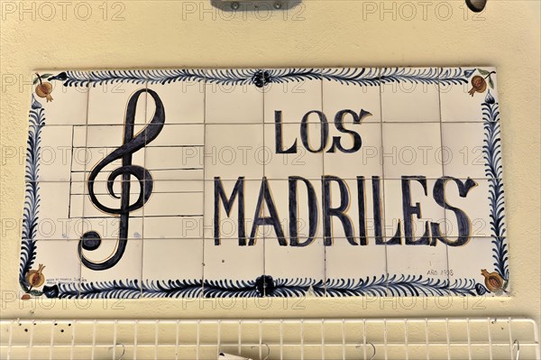 Granada, Ceramic street sign 'Los Madriles' with clef symbol, Granada, Andalusia, Spain, Europe
