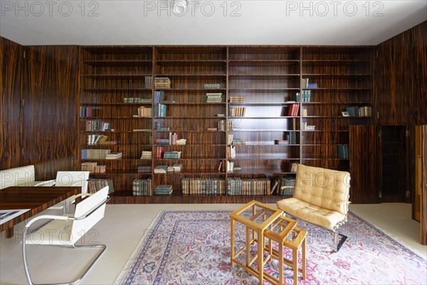 Interior view, book wall, living room, Villa Tugendhat (architect Ludwig Mies van der Rohe, UNESCO World Heritage List), Brno, Jihomoravsky kraj, Czech Republic, Europe