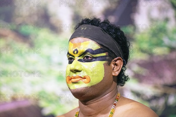 Kathakali performer or mime, 38 years old, with painted face, Kochi Kathakali Centre, Kochi, Kerala, India, Asia