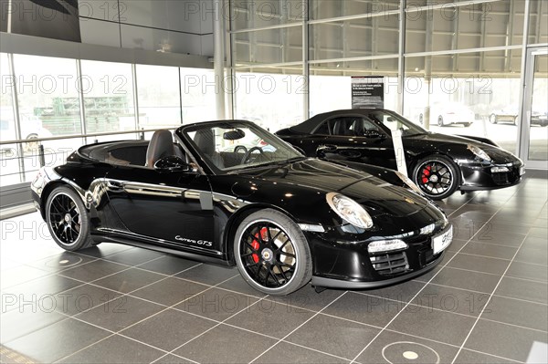 A Porsche Cayman GT3 Coupe presented at the dealership, Schwaebisch Gmuend, Baden-Wuerttemberg, Germany, Europe