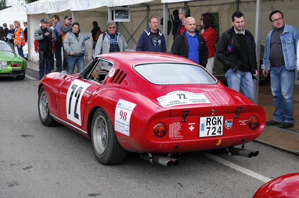 Red classic racing car with starting number 72, surrounded by spectators, SOLITUDE REVIVAL 2011, Stuttgart, Baden-Wuerttemberg, Germany, Europe