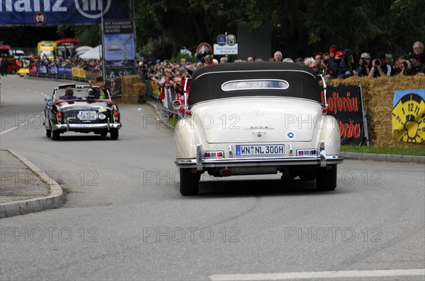 Rear view of a white Mercedes classic car on a rally road, SOLITUDE REVIVAL 2011, Stuttgart, Baden-Wuerttemberg, Germany, Europe