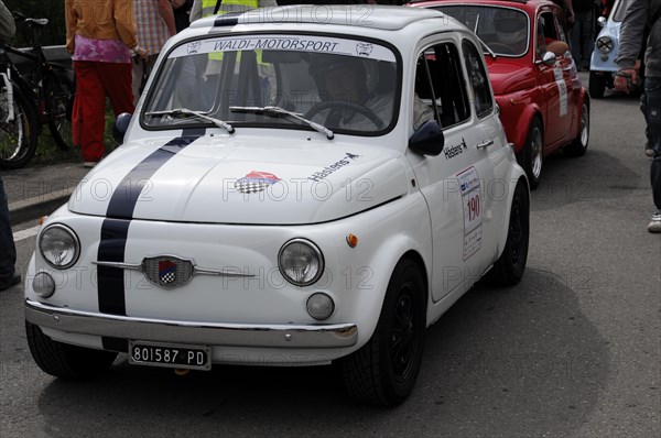 A small white Fiat 500 with race number in front of spectators, SOLITUDE REVIVAL 2011, Stuttgart, Baden-Wuerttemberg, Germany, Europe