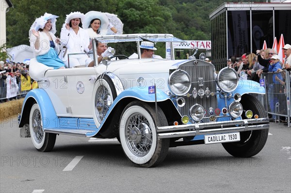 Cadillac Imperial Phaeton, built in 1930, A historic white Cadillac in a festive parade with passengers in costumes, SOLITUDE REVIVAL 2011, Stuttgart, Baden-Wuerttemberg, Germany, Europe