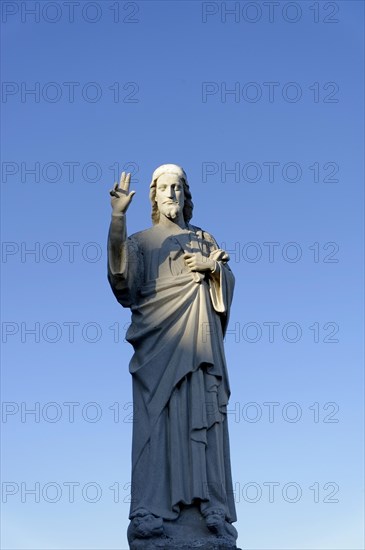 Church of Notre-Dame de la Garde, Marseille, statue of Jesus with blessing gesture under a deep blue sky, Marseille, Departement Bouches-du-Rhone, Region Provence-Alpes-Cote d'Azur, France, Europe