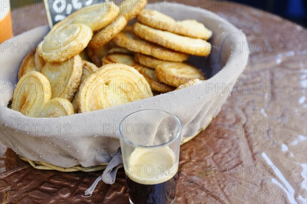 Marseille, palmier biscuits and sparkling wine in glasses, arranged in the centre, Marseille, Departement Bouches-du-Rhone, Region Provence-Alpes-Cote d'Azur, France, Europe