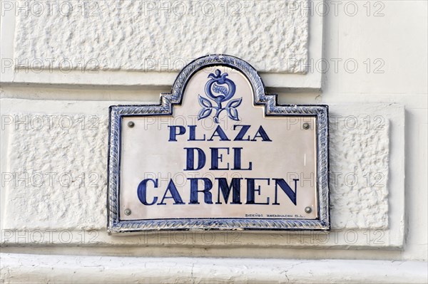 Granada, A blue bordered white street sign with the inscription Plaza del Carmen, Granada, Andalusia, Spain, Europe