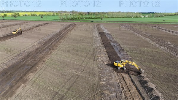 Excavators begin preparations for the construction site access road on the L 50 at the future Intel construction site in Magdeburg. The state of Saxony-Anhalt is financing the expansion of two construction site access roads from the L 50 state road to the Intel site, 08.04.2024., Magdeburg, Saxony-Anhalt, Germany, Europe