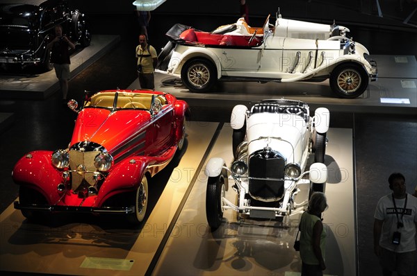 Large number of restored classic cars on display in a museum, Mercedes-Benz Museum, Stuttgart, Baden-Wuerttemberg, Germany, Europe