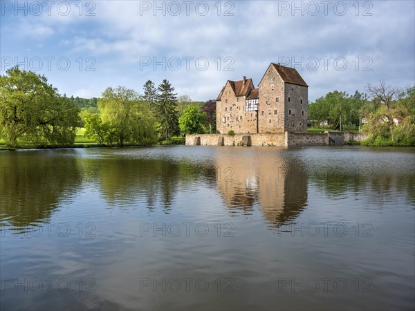 Wasserburg, moated castle Brennhausen near Sulzdorf an der Lederhecke, Hassberge, Rhoen-Grabfeld, Lower Franconia, Bavaria, Germany, Europe