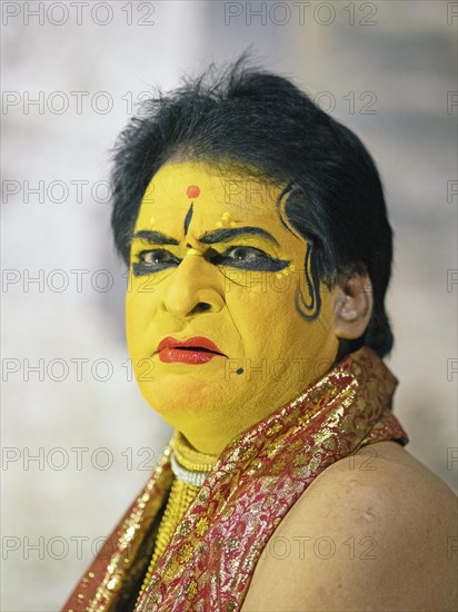 Kathakali performer or mime, 60 years old, with painted face, Kochi Kathakali Centre, Kochi, Kerala, India, Asia